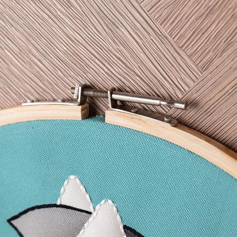 Close-up of the zebra wall accent showing its metal clasp and fabric texture