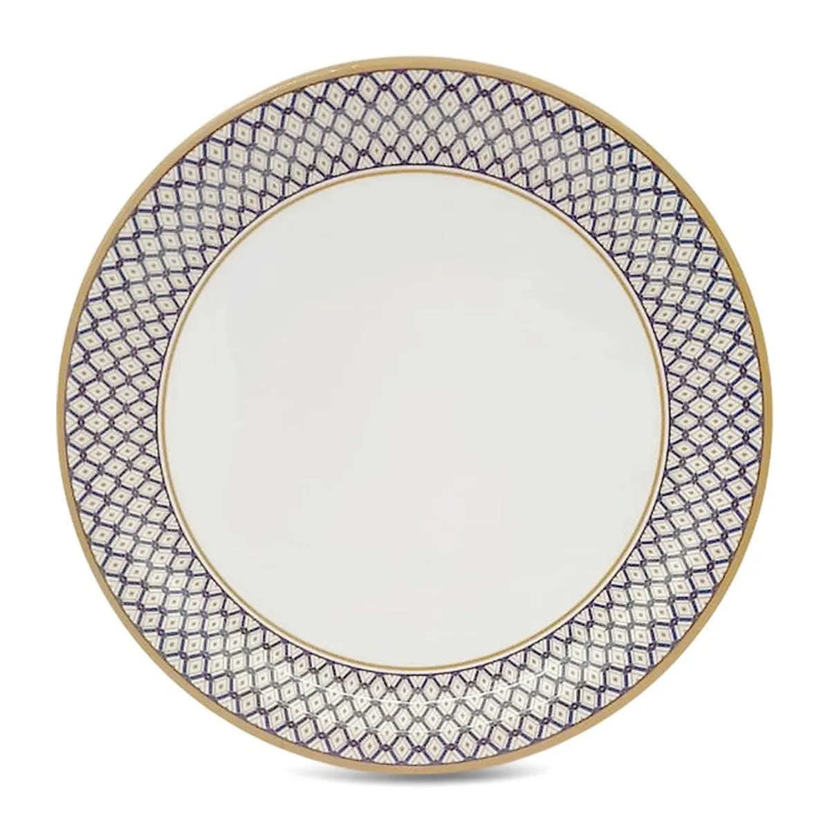 Close-up of a round white dinner plate with blue geometric patterned rim