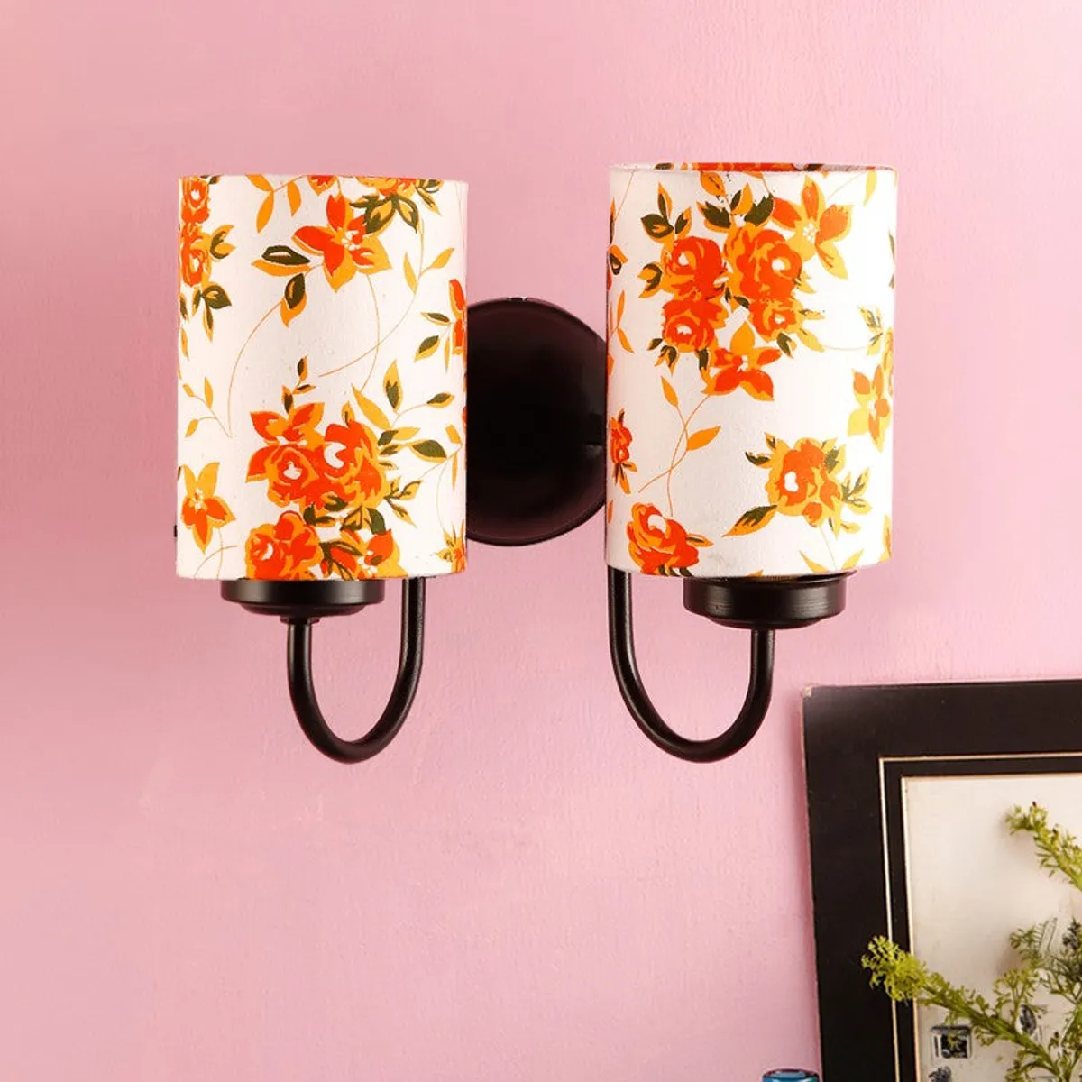 White and orange floral double wall lamp with dark iron base