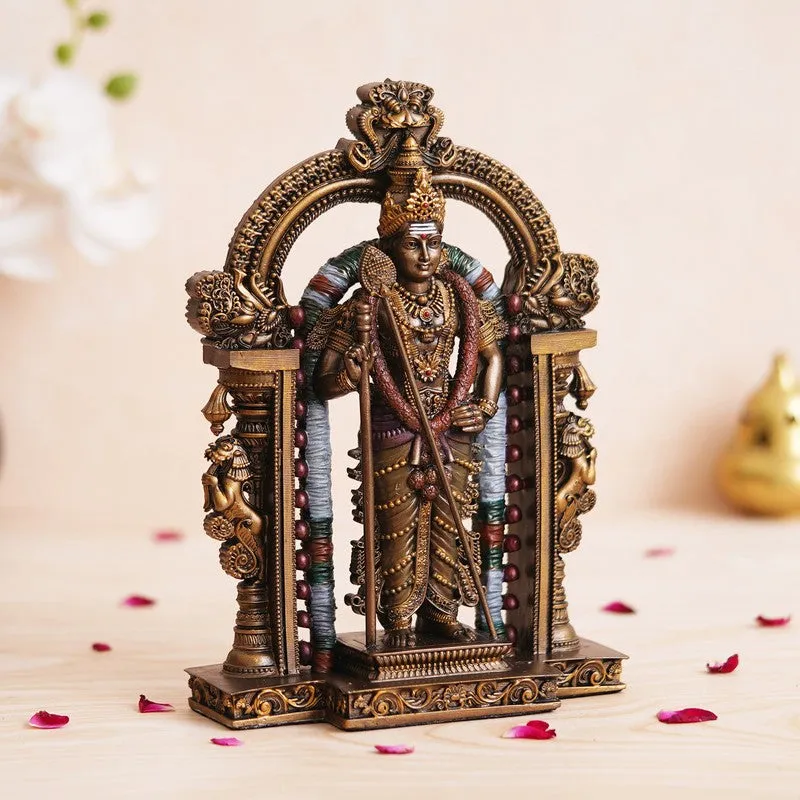 Angled view of the ornate Vel Murugan idol with a bronze-toned finish