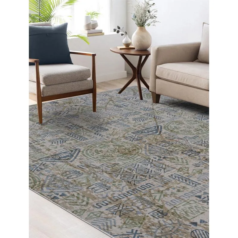 Blue and green abstract carpet styled in a living room