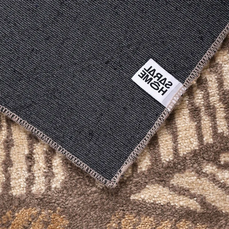 Close-up of the carpet's black anti-skid backing and edge