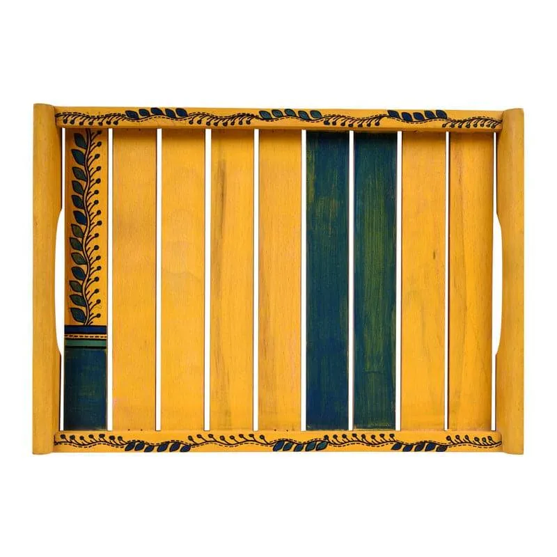 Top view of a yellow rectangular tray with leafy border and green stripe detailing