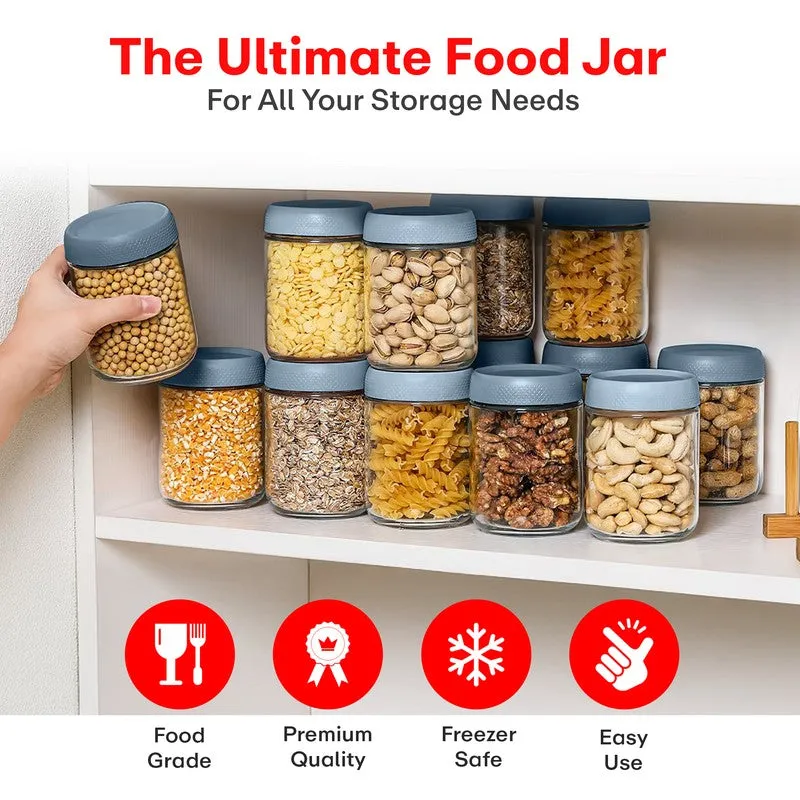 Multiple blue-lidded glass jars organising pulses, pasta, grains and nuts on shelves
