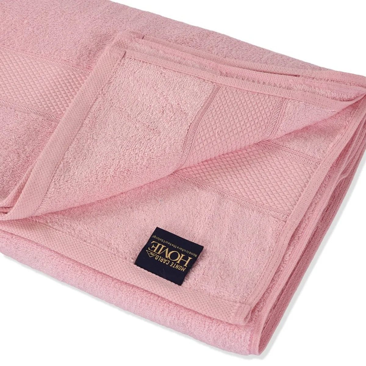 Close-up of the light pink towel's plush surface and textured border