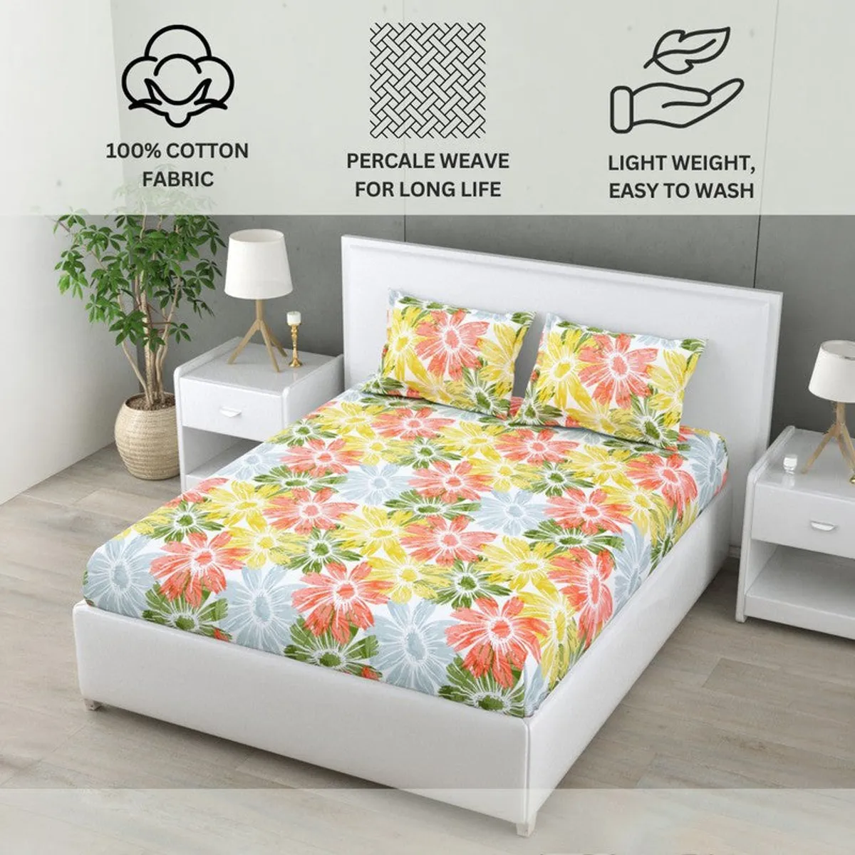 Floral bedsheet styled on a bed with matching pillow covers