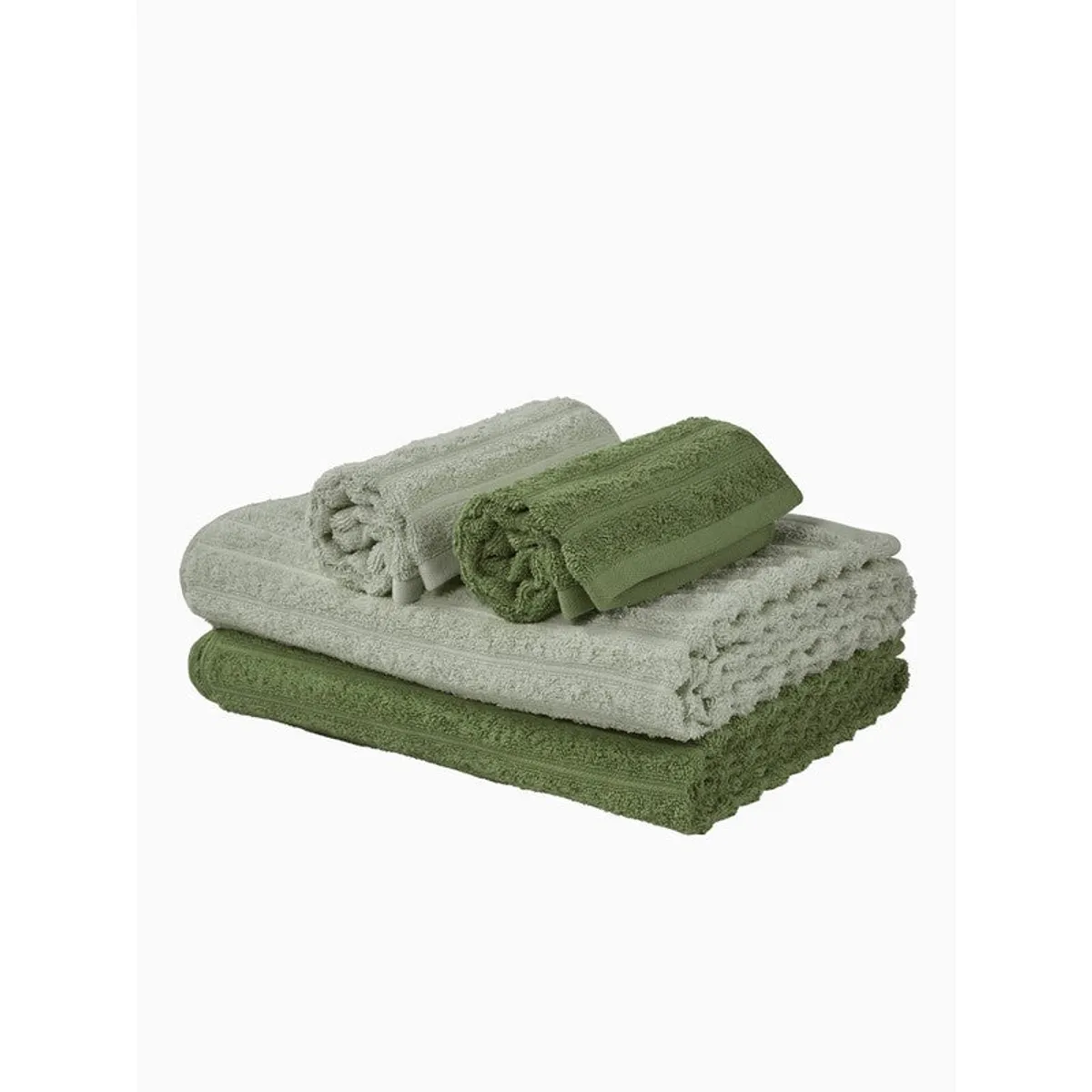 Stacked green and grey bath and hand towels on white