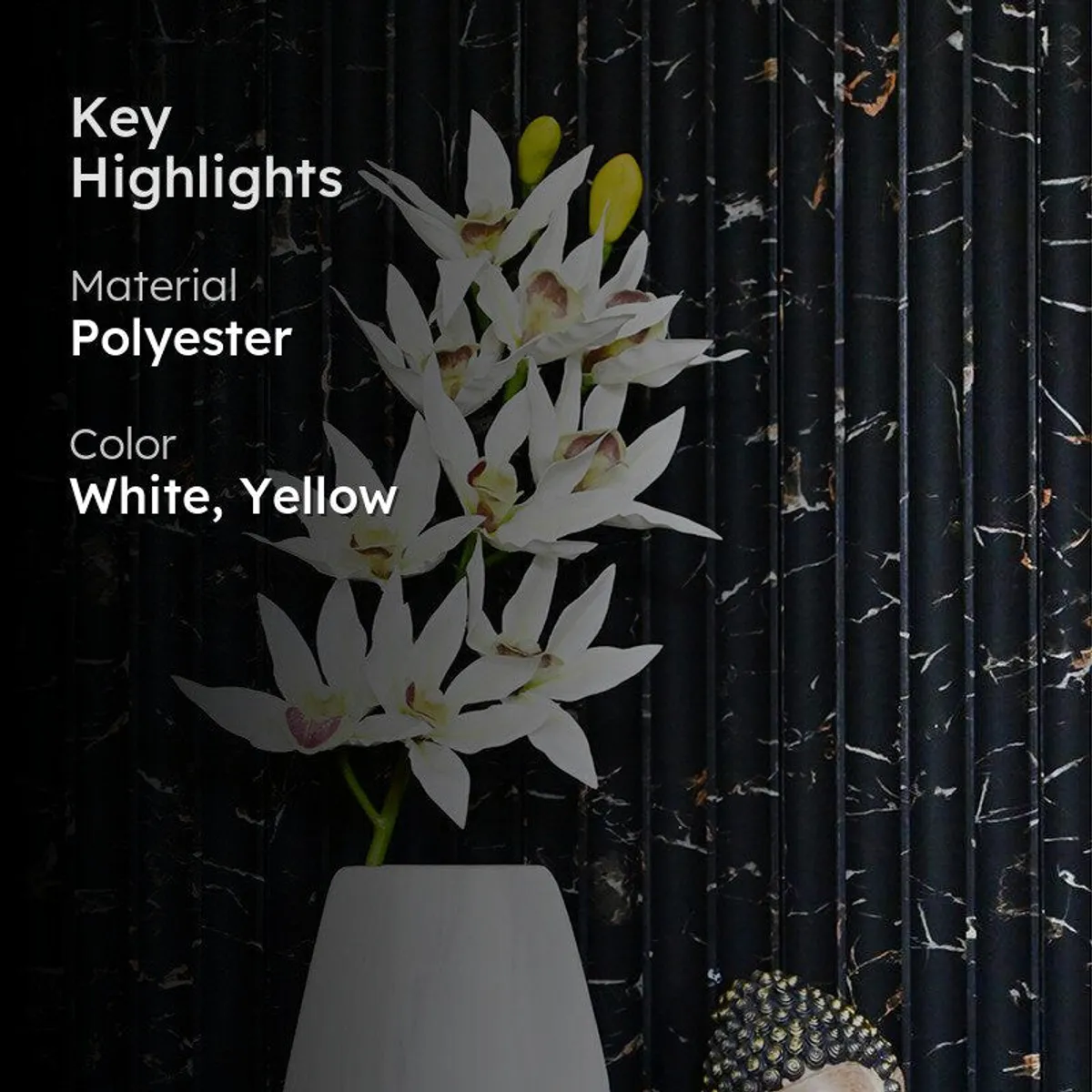 White and yellow artificial orchid flower stick against a dark backdrop