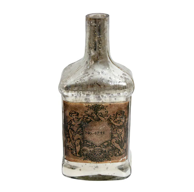 Front view of a brown speckled glass bottle vase with vintage-style label
