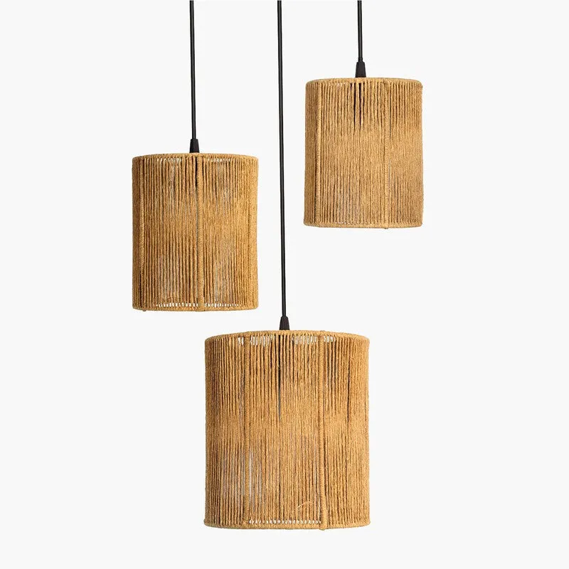 Close view of three cylindrical beige raffia lamp shades