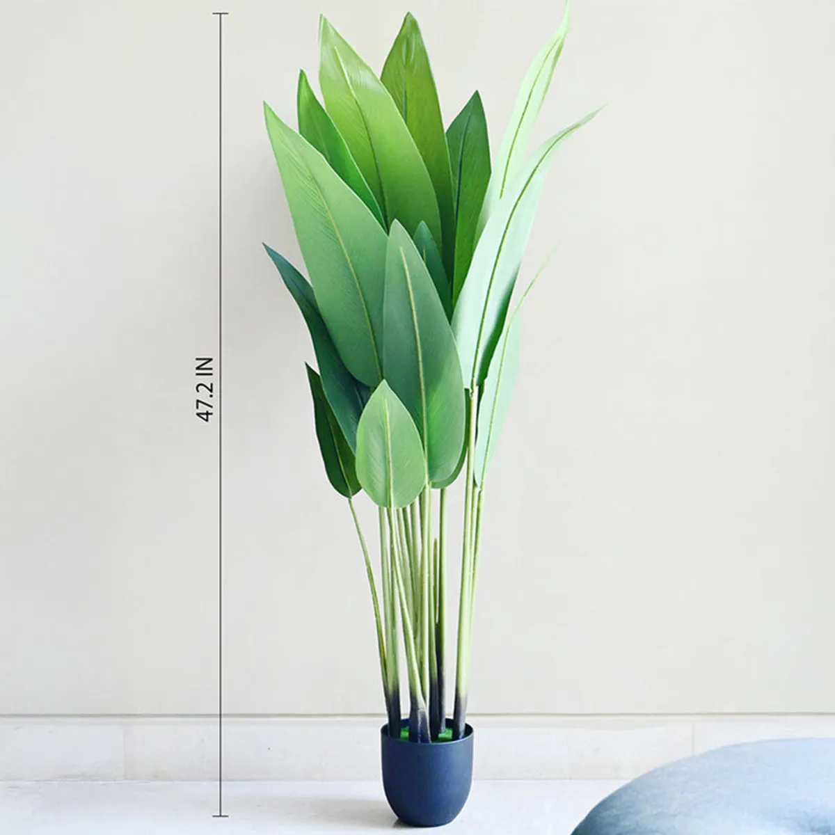 Artificial Bird of Paradise plant in a black pot shown with height marker