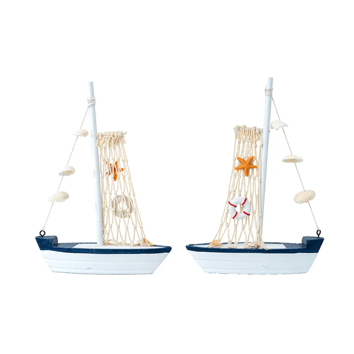 Two side views of the sailboat wood showpiece on a plain background