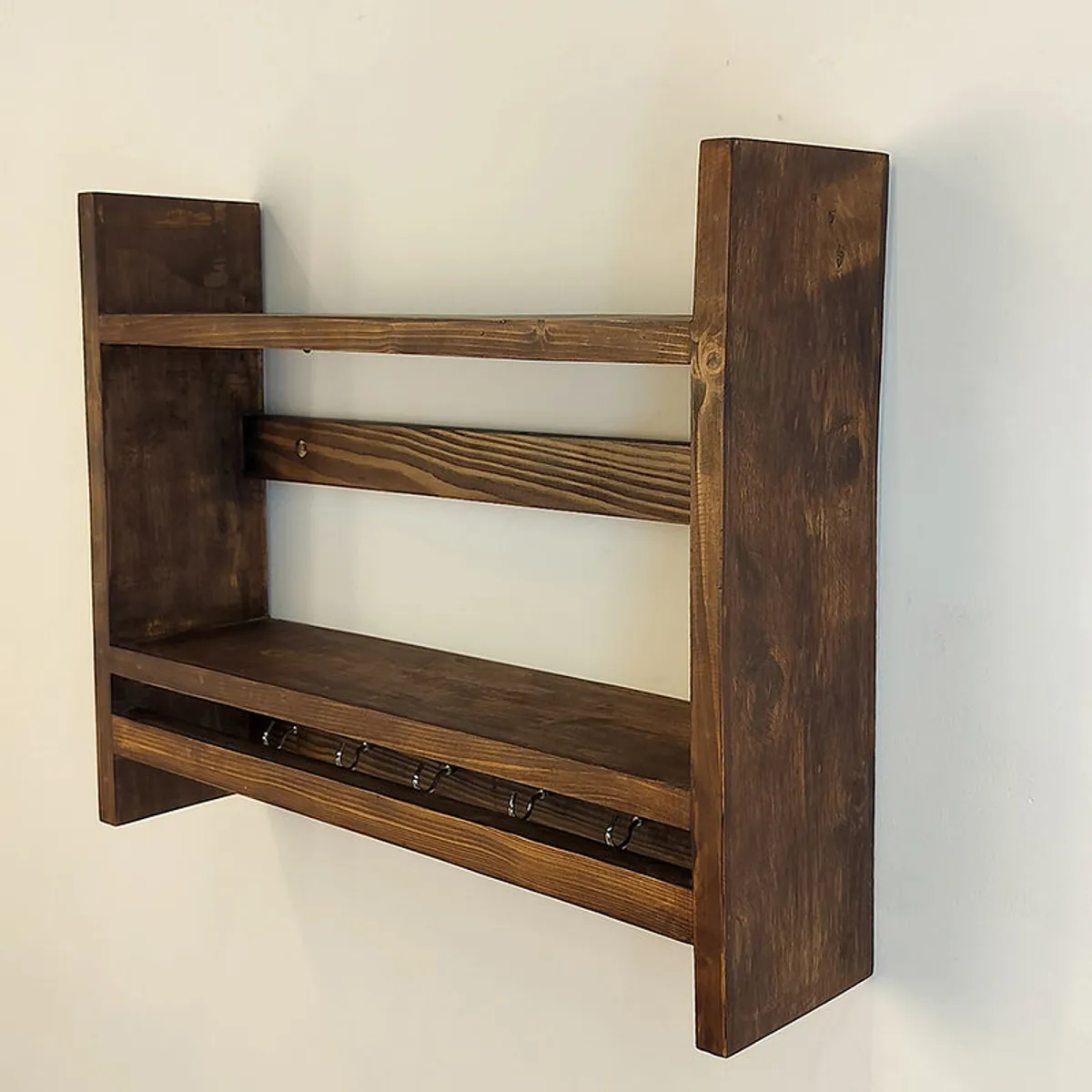 Side view showing the depth and wooden construction of the kitchen rack
