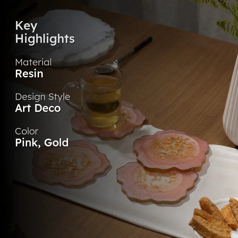 Styled dining table with pink coasters and a glass mug