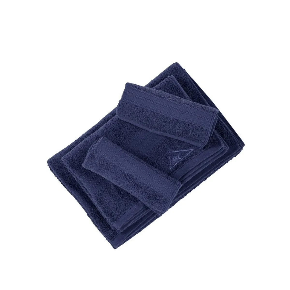 Blue towel set folded and layered on a white background