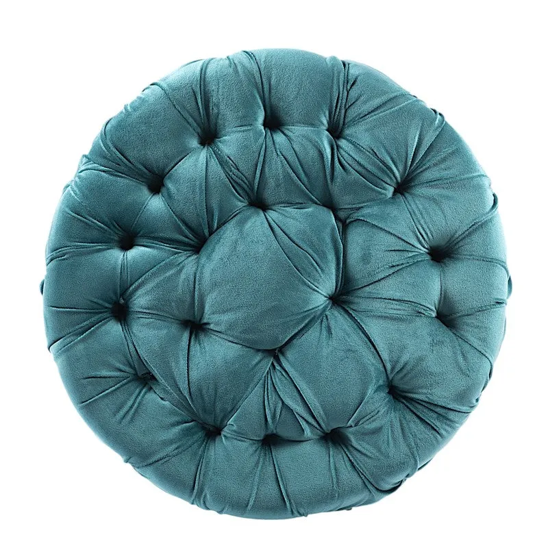 Top view of round blue tufted ottoman