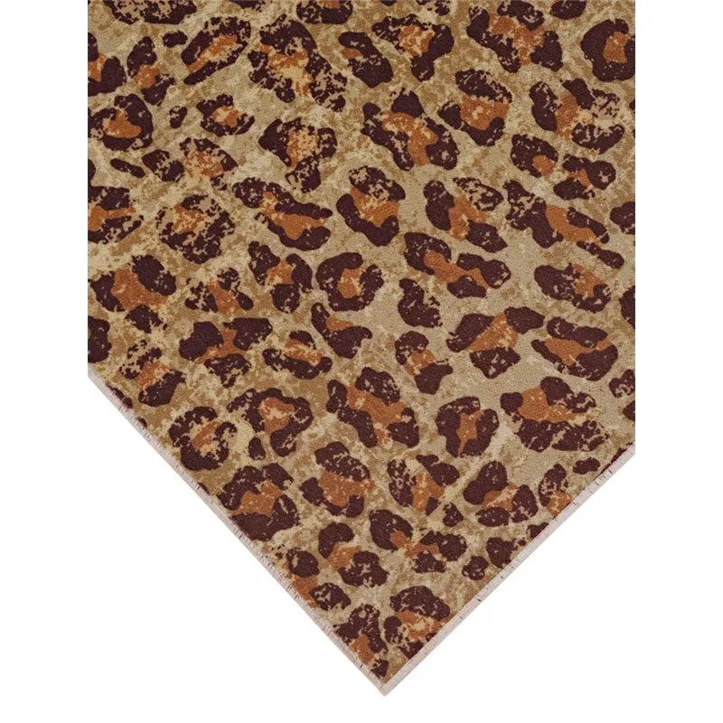 Corner view of a light brown carpet with leopard-style animal pattern