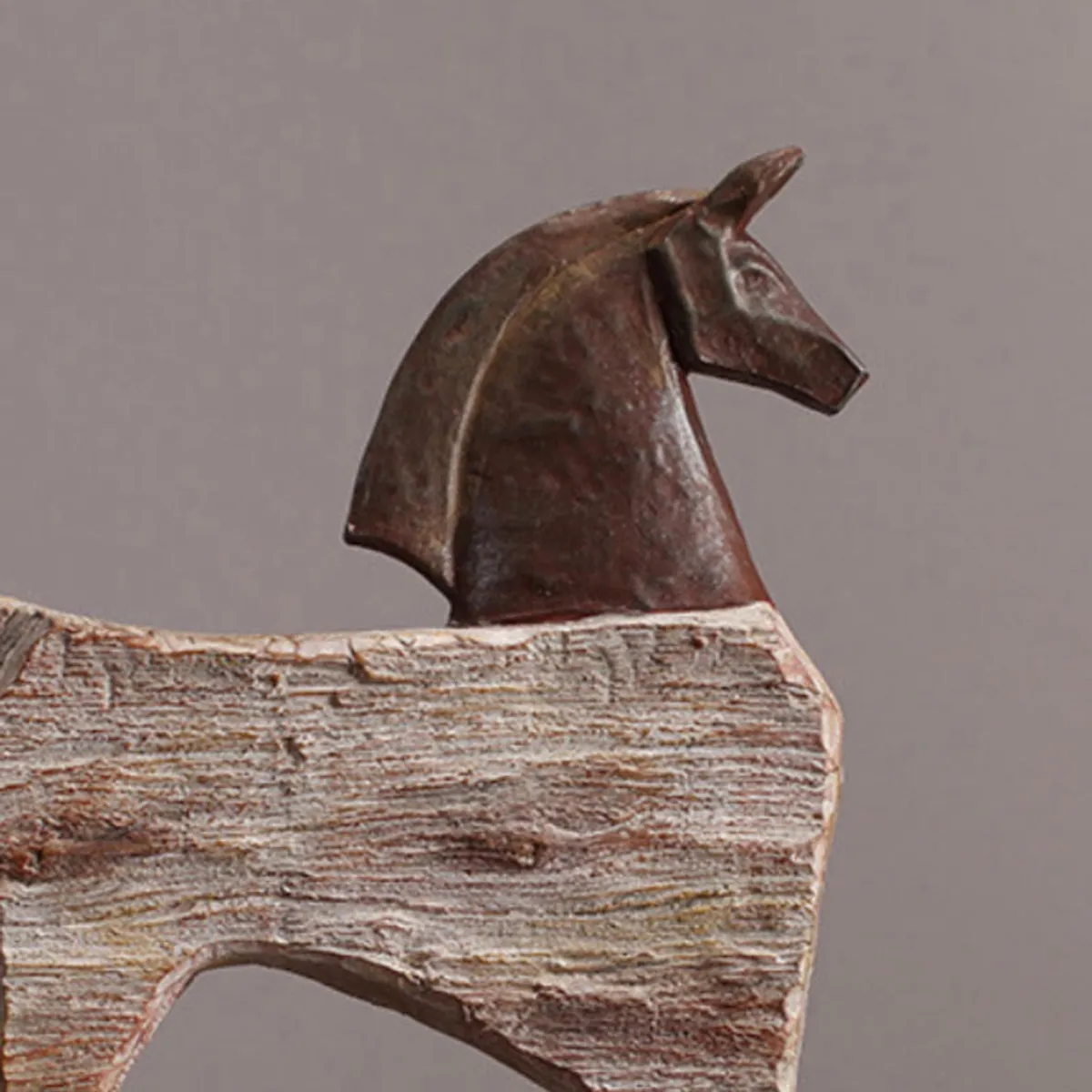 Close-up of the horse head and upper body of the brown abstract showpiece