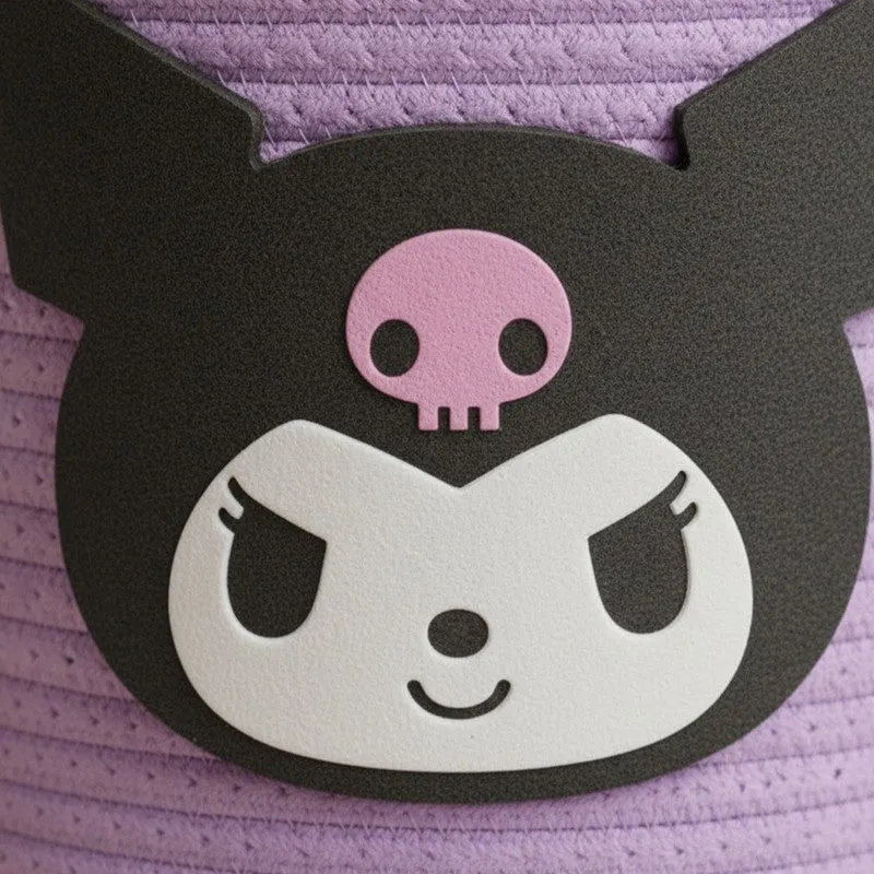 Close-up of the black and pink character motif on the purple basket