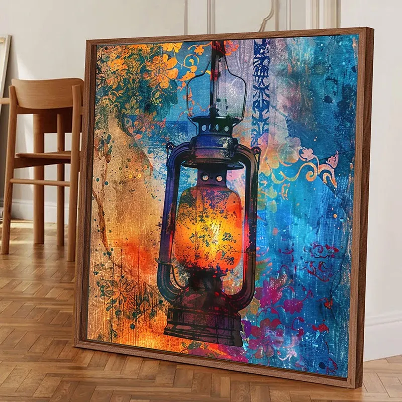 Framed canvas wall art featuring a glowing lantern over a vibrant blue and orange abstract background