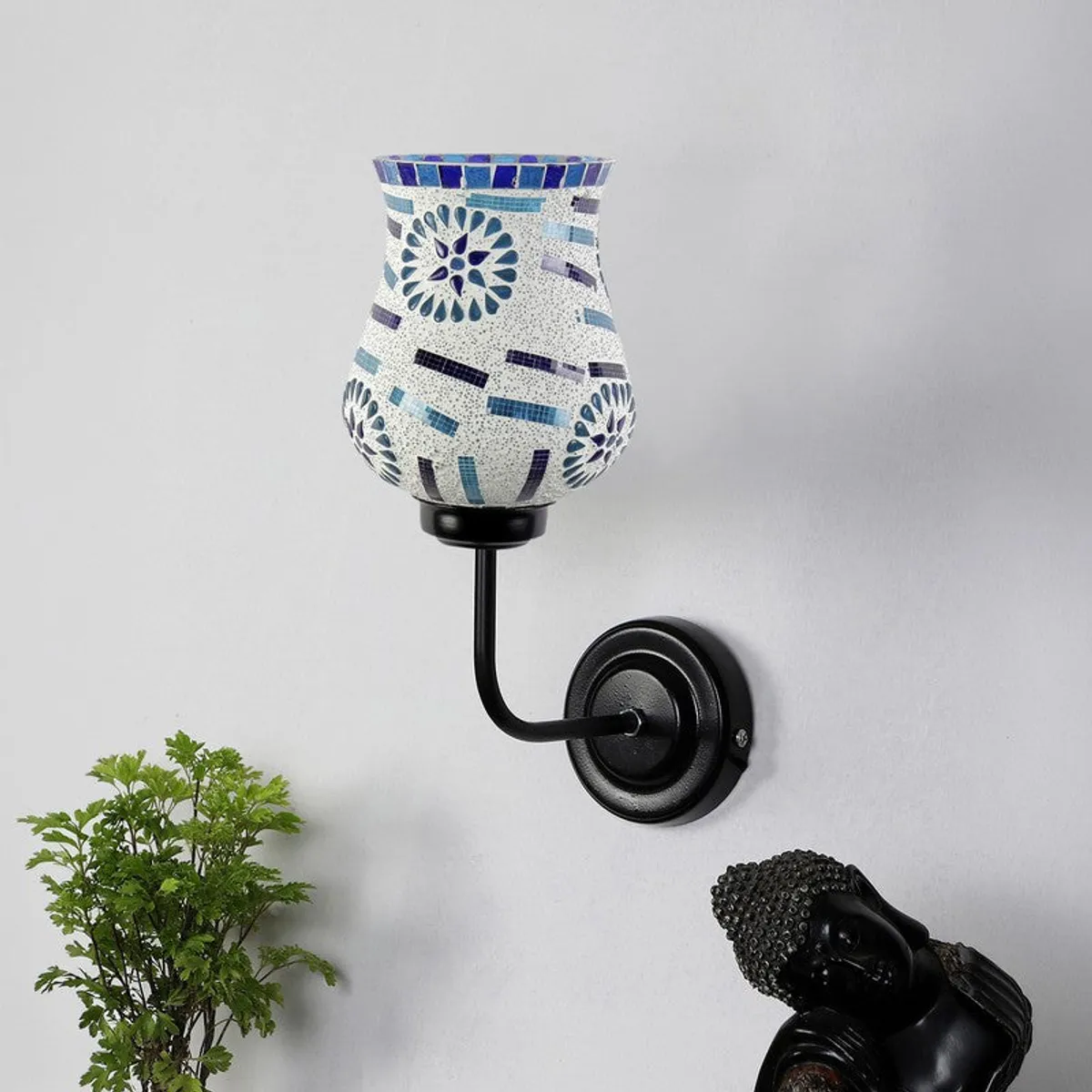 Blue and white mosaic glass wall lamp with black iron arm