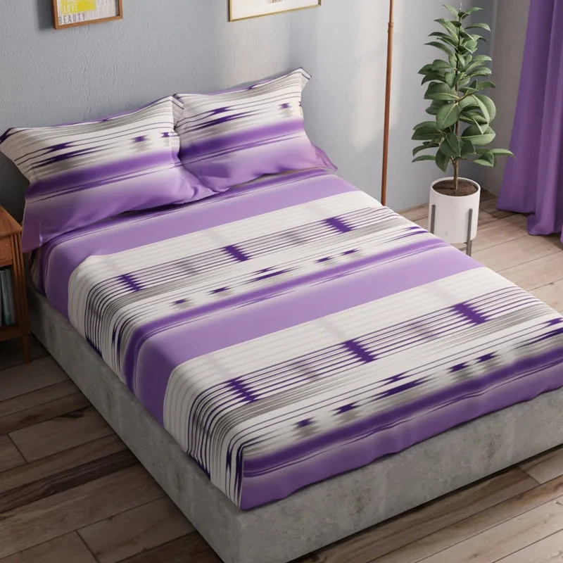 Queen/Double bed dressed in a purple abstract striped cotton bedsheet set