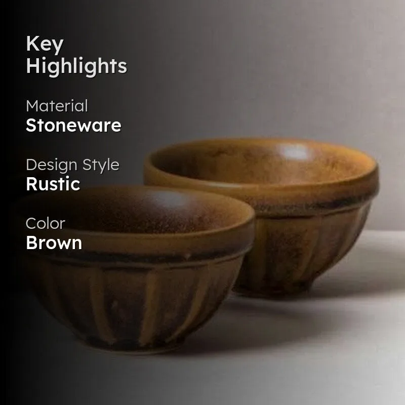 Two glossy brown rustic bowls displayed against a neutral background