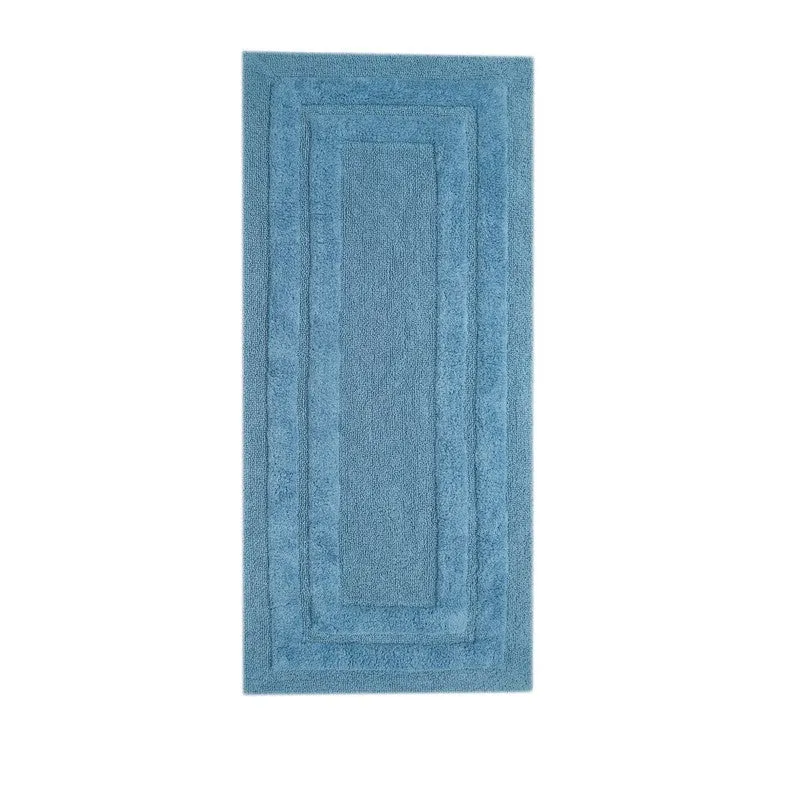 Light blue rectangular runner rug on a plain white background