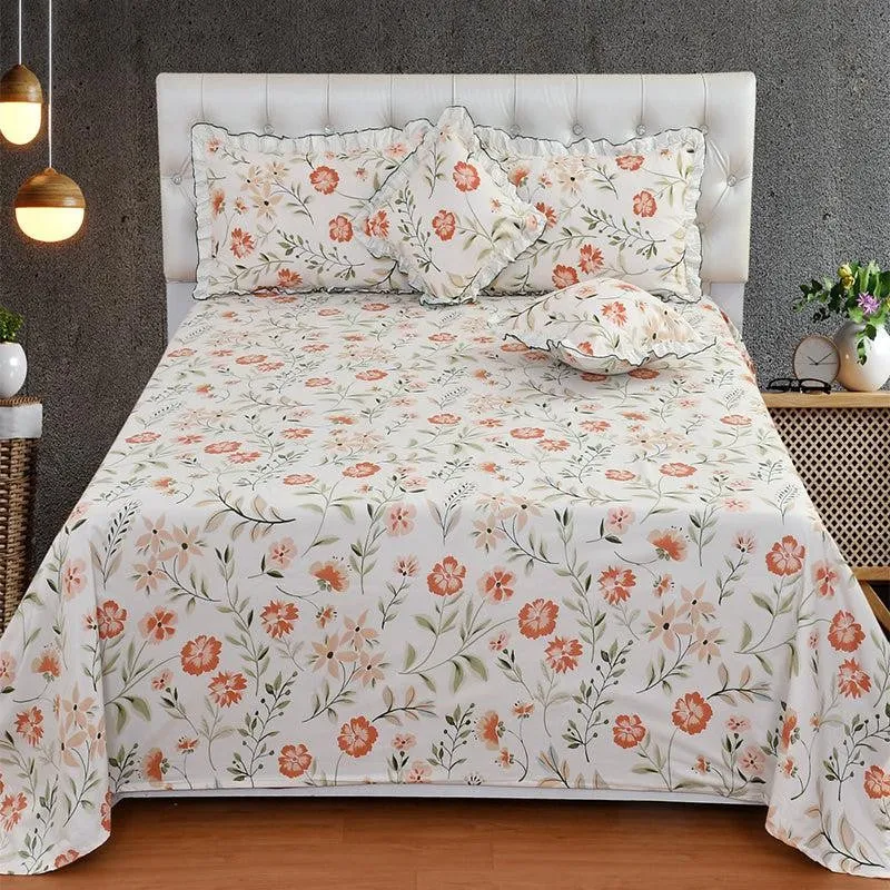 Front view of floral bedding set with frilled cushions and pillow covers