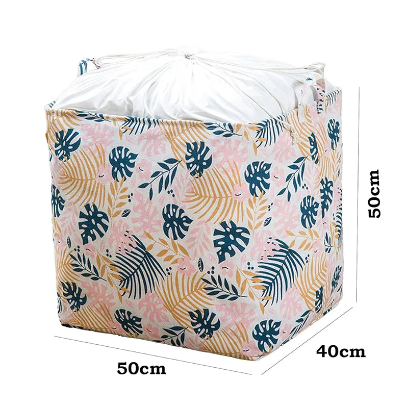 Pink leafy-print laundry basket shown with 50 cm height and 50 by 40 cm base
