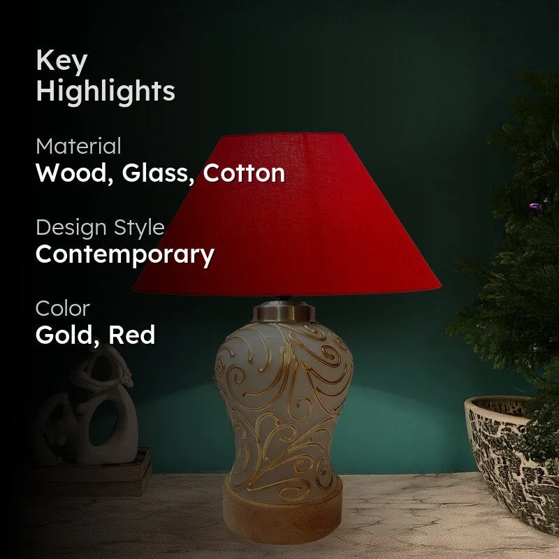 Red table lamp with cone shade and decorative white gold base in styled setting