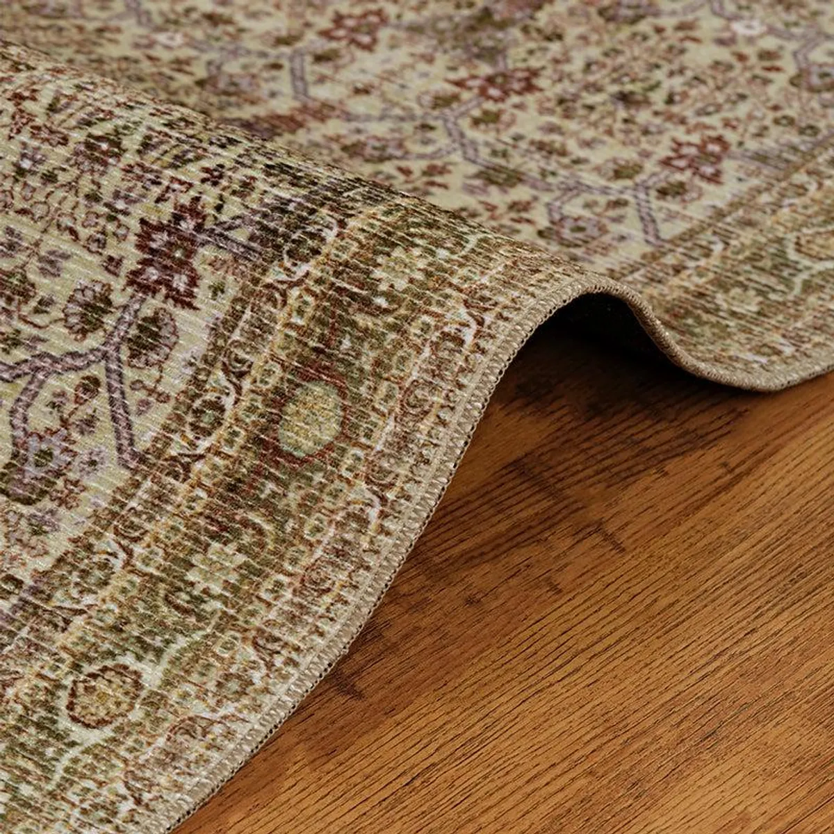 Rolled corner showing the patterned surface and carpet edge