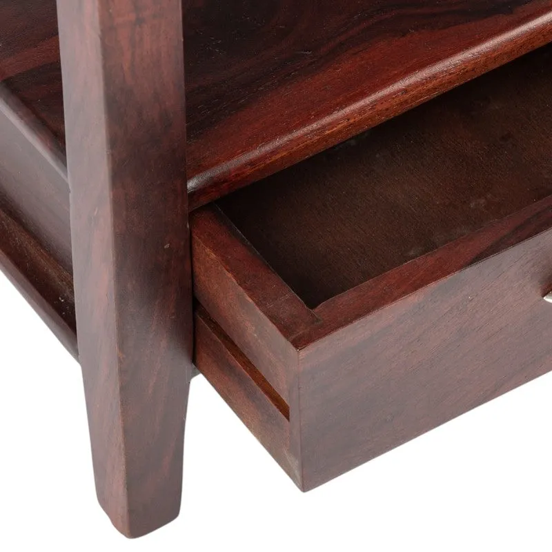 Close-up of the dark wood table drawer and side leg.