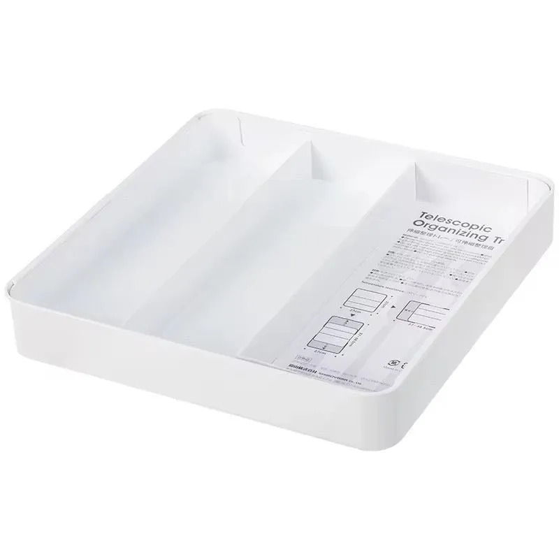 White plastic cutlery tray shown empty with multiple compartments