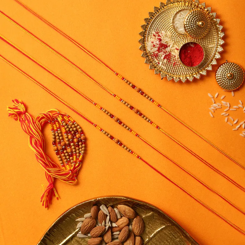 Aum II Rakhi with Roli Chawal - Thirteen Piece Set media 1