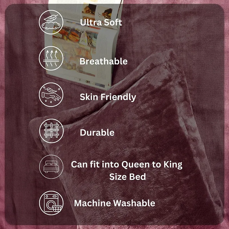 Pink velvet bedsheet and pillow cover close-up with feature icons overlay