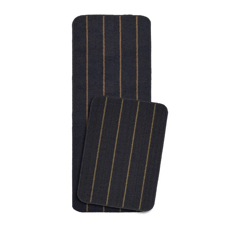 Two navy striped kitchen mats overlapped against a white background