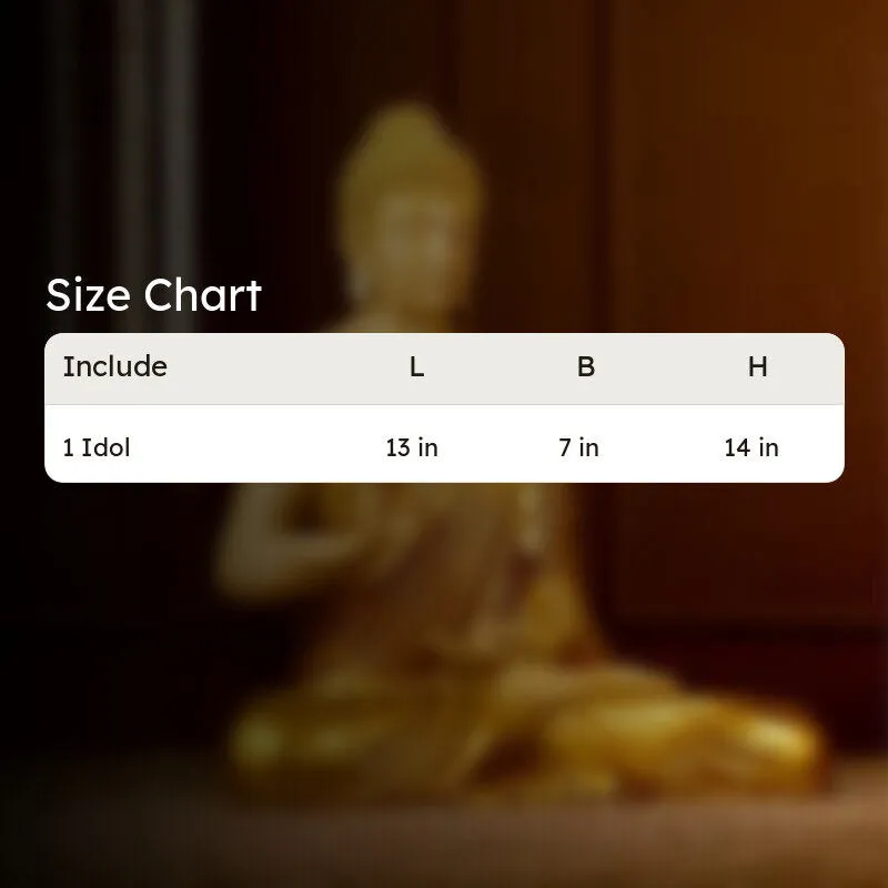 Gold Buddha idol shown in a softly blurred interior setting.