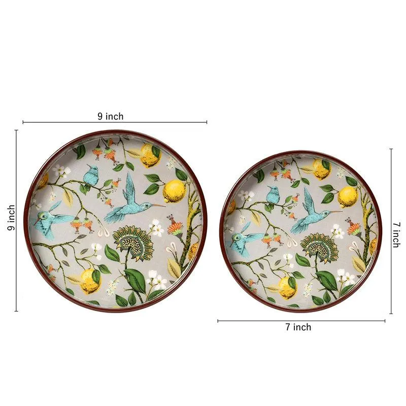 Two round trays shown with size labels, one approximately 9 inches and one 7 inches.