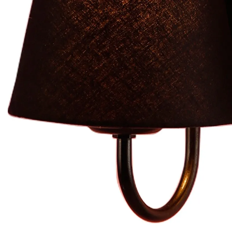 Close-up of the black metal arm and shade