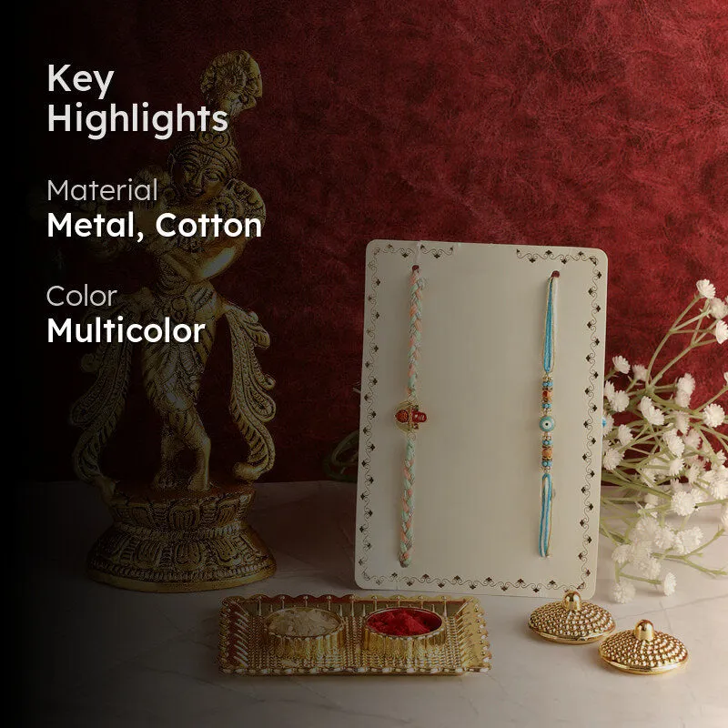 Krishna idol, two rakhis and pooja tray with material and colour highlight text
