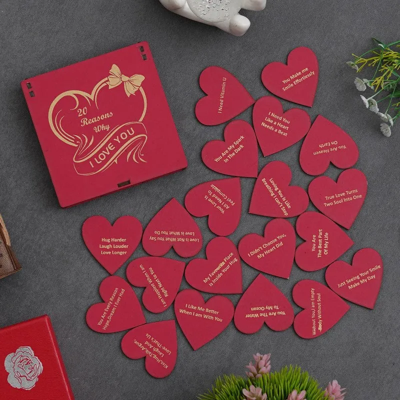 Red gift box with multiple heart-shaped love notes spread out