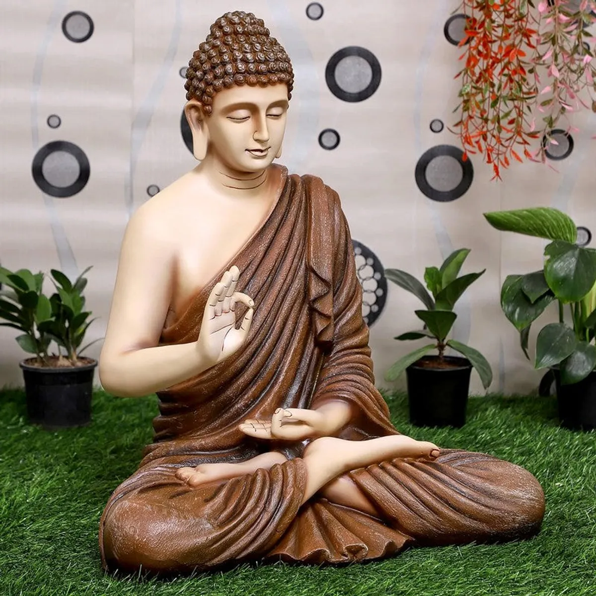 Front angled view of seated Buddha showpiece in brown and ivory
