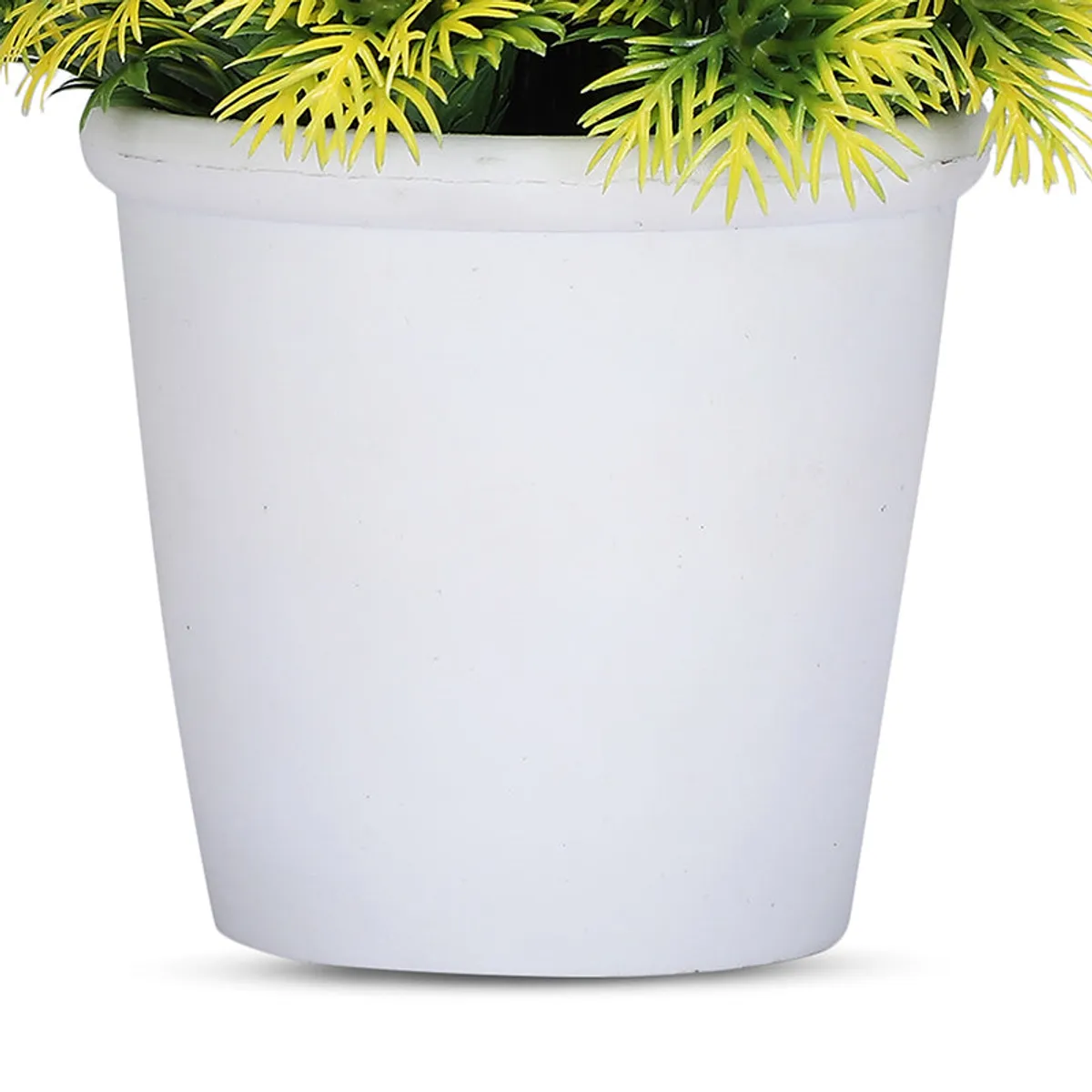Close-up of yellow-green artificial leaves above a white plastic pot