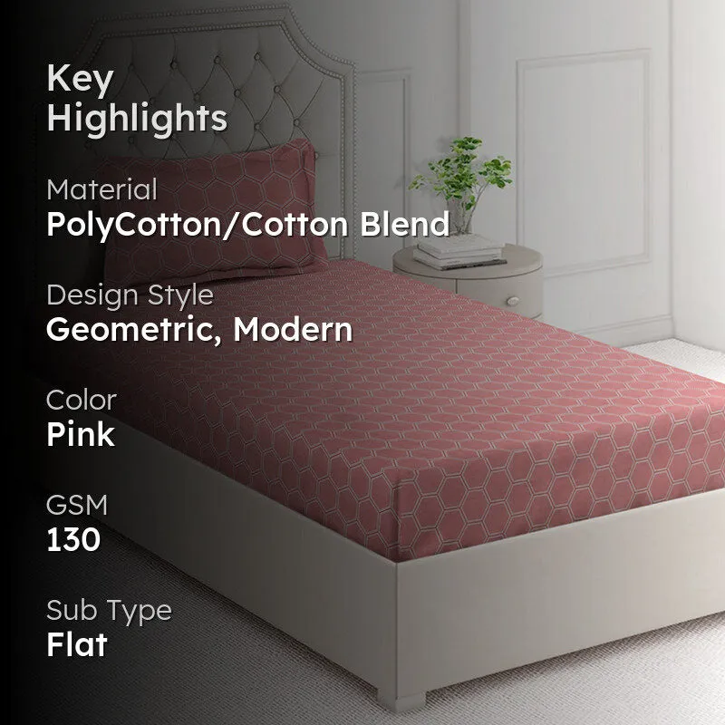 Pink geometric bedsheet on bed with highlight text overlay