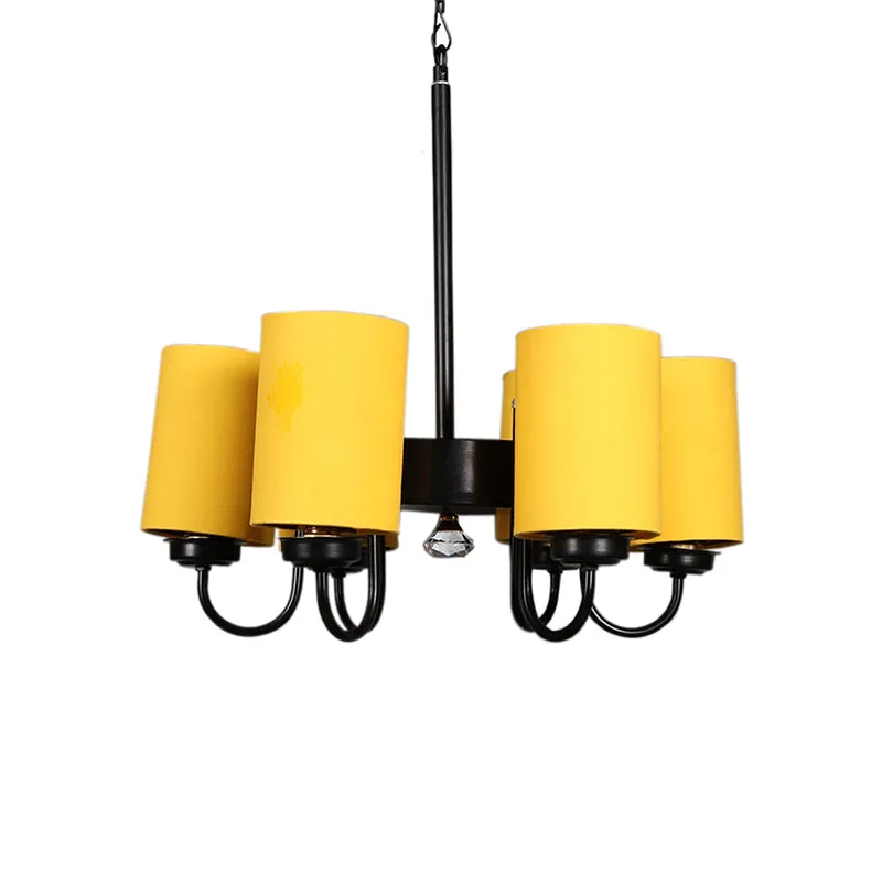 Front view of the yellow cluster-style ceiling lamp with black frame
