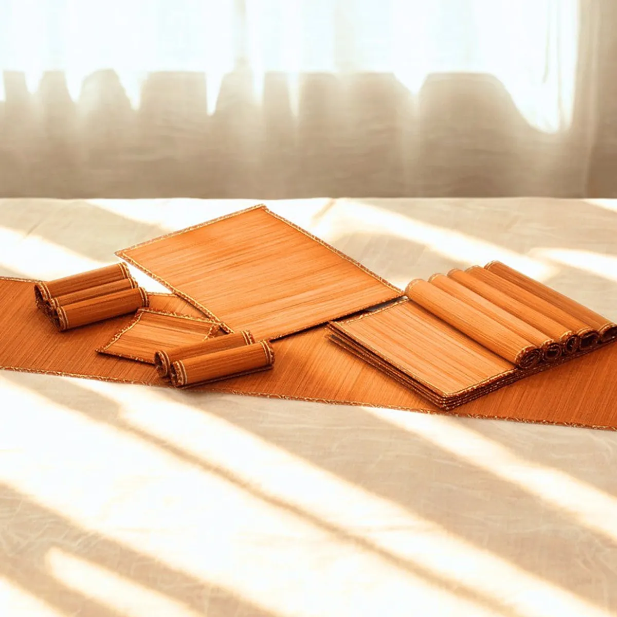 Orange table linen pieces arranged in warm natural light