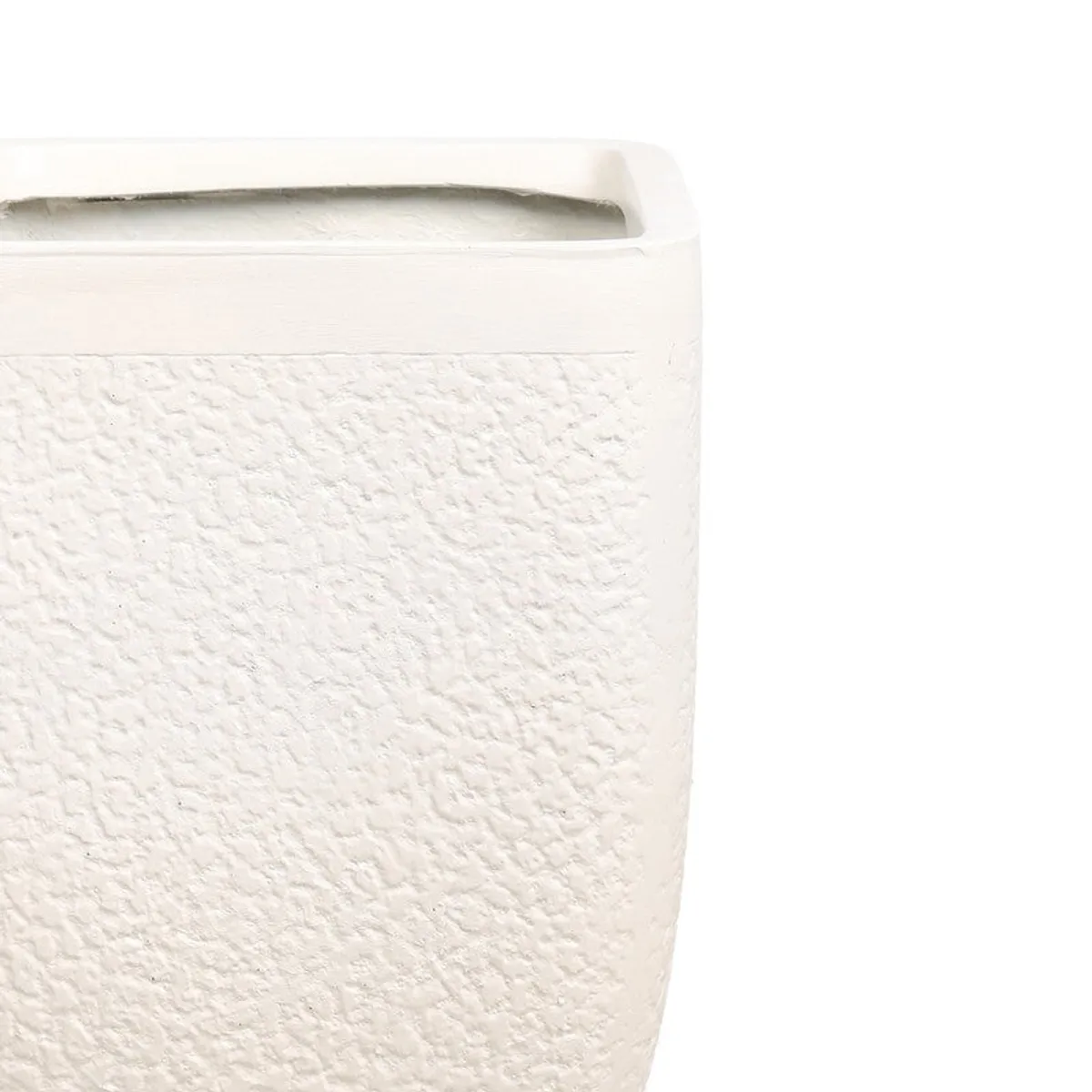 Close-up of the planter's white textured surface and smooth rim