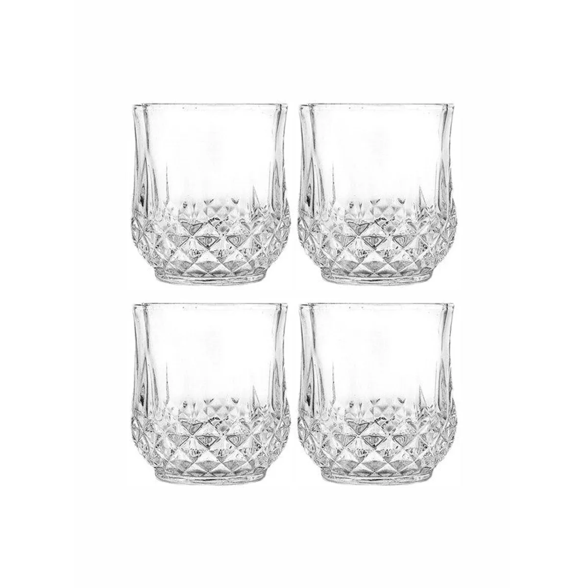 Four clear whiskey glasses shown together against a white background