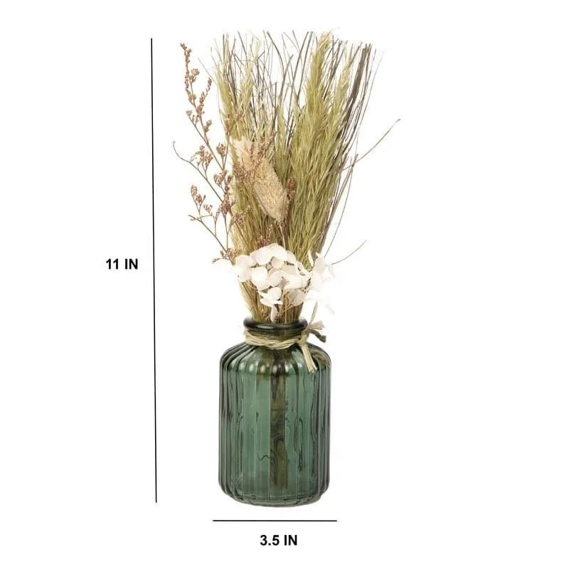 Green glass vase with dried flowers, shown with height and width markers